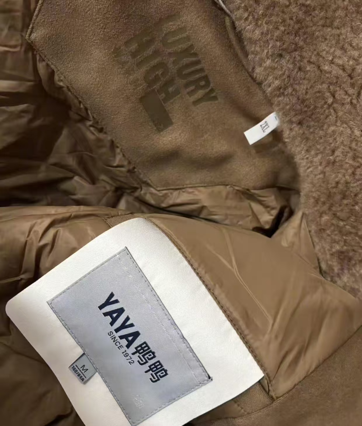 鸭鸭羽绒服 “双标双码”引争议，品牌方回应-313啦实用网