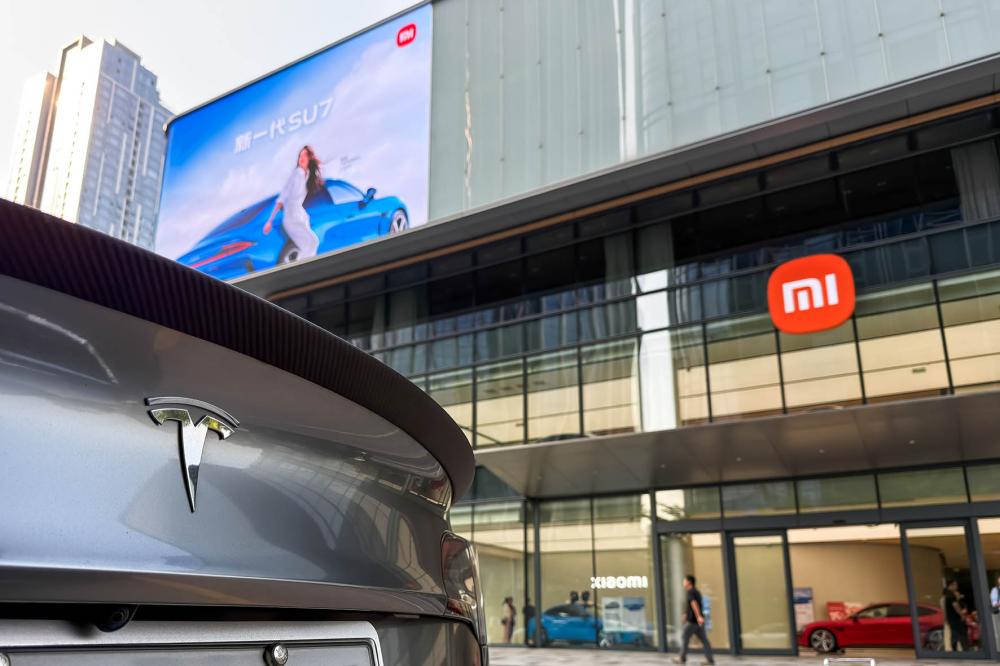 小米新SU7 逼急特斯拉-313啦实用网